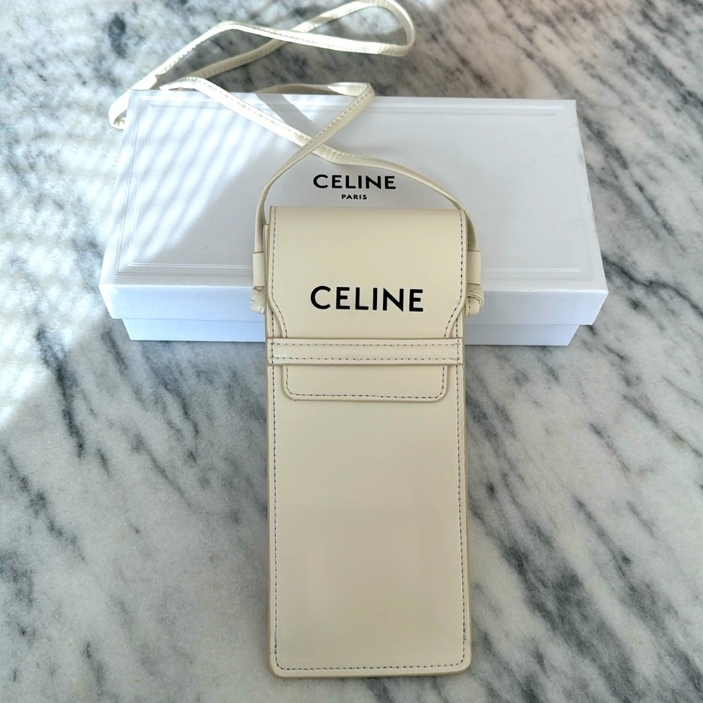 CELINE leather crossbody bag. It came with my sunglasses. Never worn.